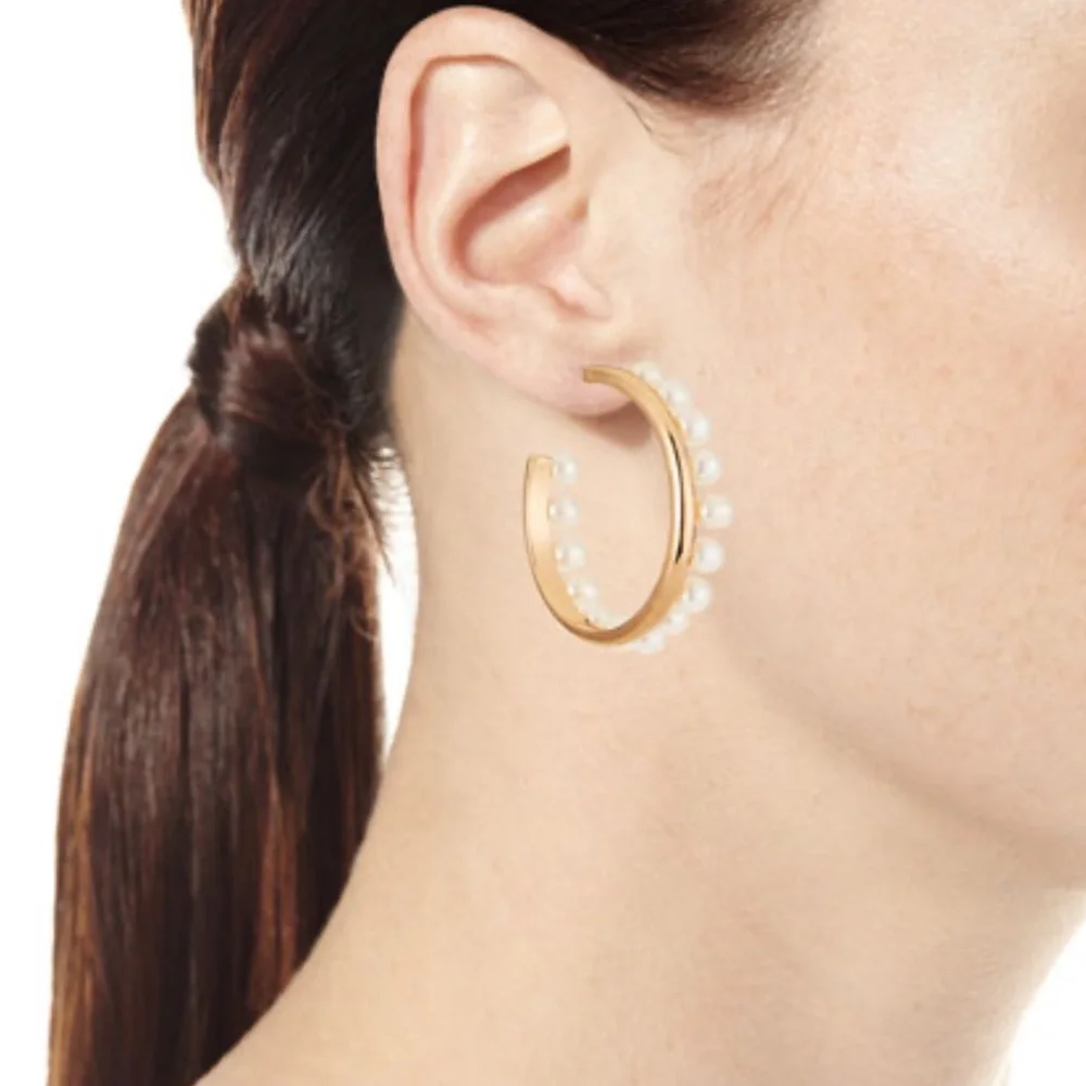 Tory Burch Pear fringe hoop Earrings.